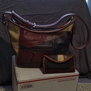 Hand crafted leather bag , with a matching wallet